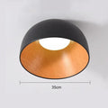 Nokara noir vu de dessous, coque mate et bois, diamètre 35 cm